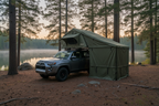 Trailhead Soft Shell Rooftop Tent in a serene wilderness setting